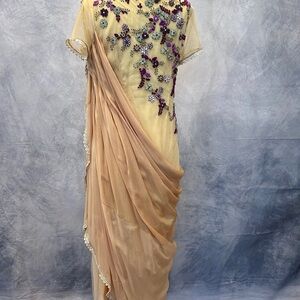 Elegant Cream and Purple Swarovski Embellished sari gown.